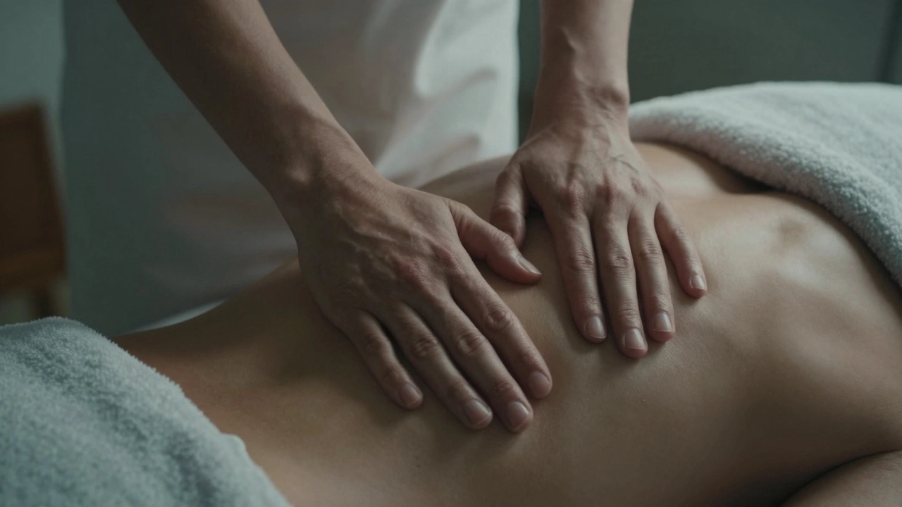 Hands performing smooth, rhythmic strokes on a man's back draped in a white towel.